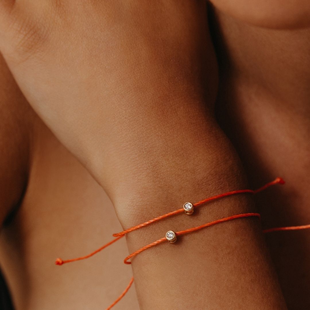 Prima Solitaire Orange Cord Bracelet