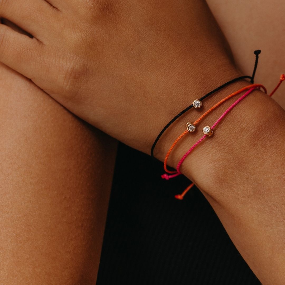 Prima Solitaire Orange Cord Bracelet