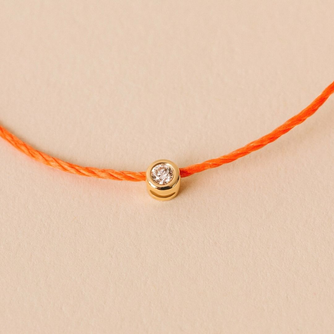 Prima Solitaire Orange Cord Bracelet