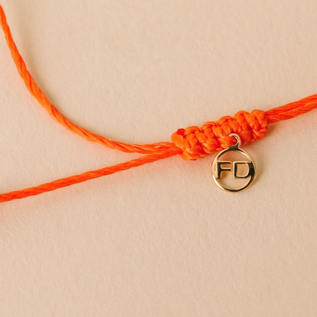 Prima Solitaire Orange Cord Bracelet