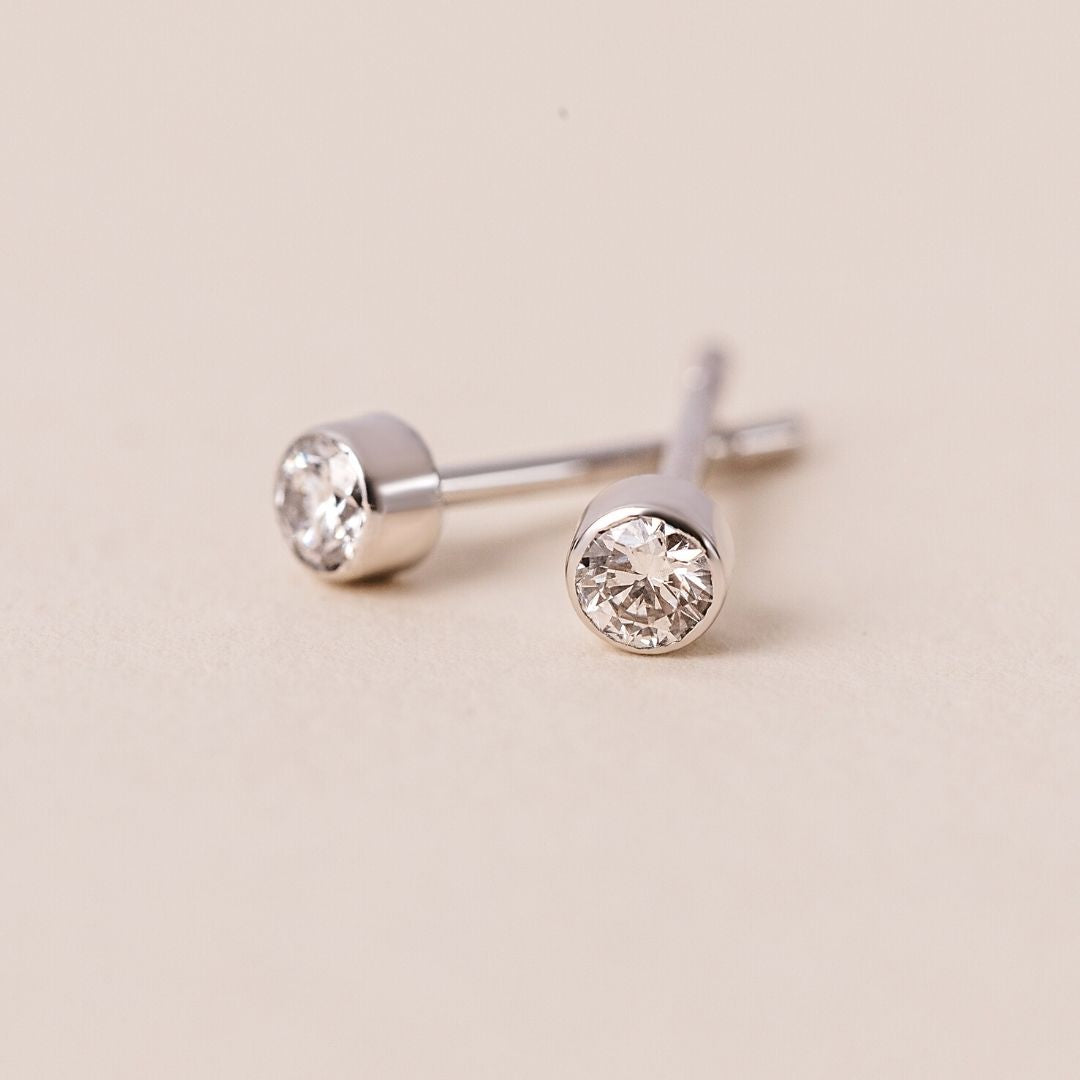 Leola Bezel Round Diamond Stud Earrings - 18 White Gold